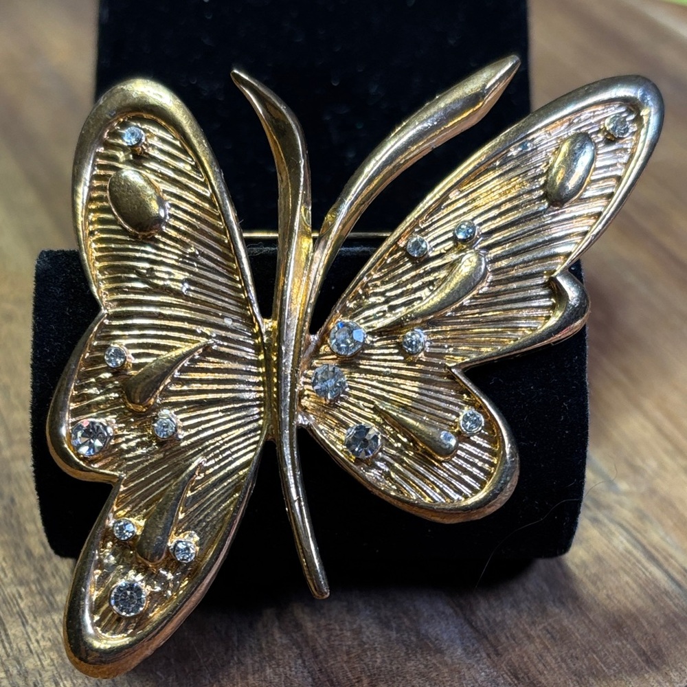 Vintage gold tone butterfly brooch with rhinestones